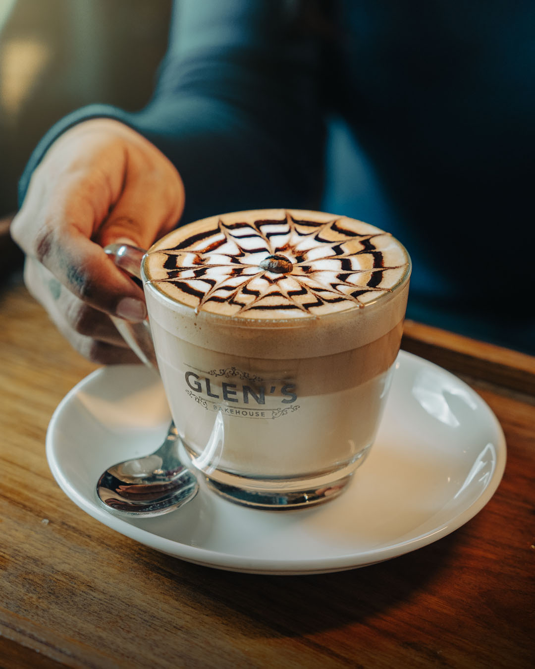 Glen’s Bakehouse cappuccino with latte art, shot for social